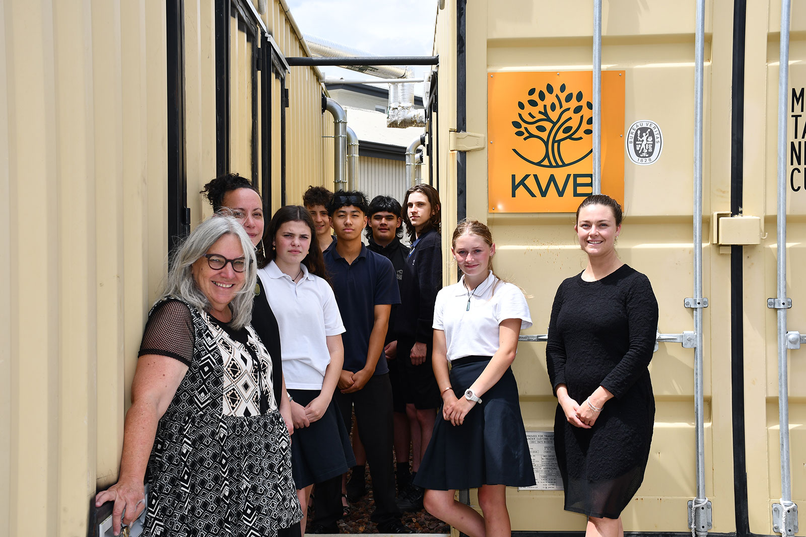 Ruapehu College students and staff with their containerised wood pellet boilers.. 