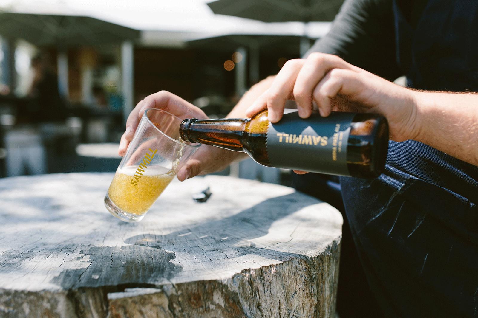 Pouring a beer at Sawmill Brewery. 